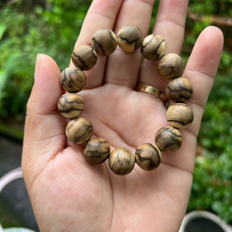 Vòng trầm hương tự nhiên tốc bông thơm ngọt sâu 14 li